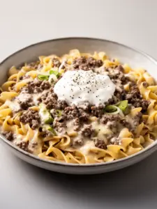 Bowl of 30-Minute Ground Beef Stroganoff with creamy sauce and noodles